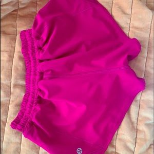 Ripened Raspberry Hotty Hot 2.5” low-rise Lululemon shorts in a size 0 . Used